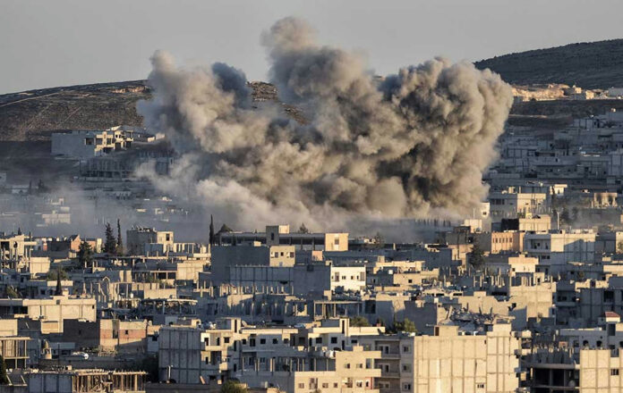 357175997 Smoke rising from buildings in a city.