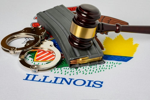 shutterstock2249776689jpg Gavel, handcuffs, and rifle magazine on Illinois state flag