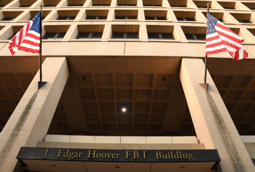 Washington,,D.c./usa,--,August,10,,2018:,American,Flags,Outside,The Exterior view of the J. Edgar Hoover FBI Building with American flags