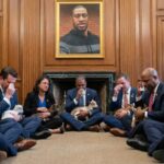Shocking Tribute: George FLOYD Over Troops? Politicians sitting on the floor holding goats in a solemn gathering