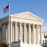 Supreme Court Redraws Limits On Federal Agencies United States Supreme Court building with American flag.