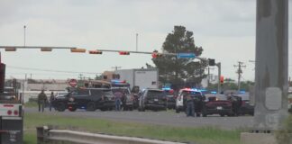 Texas shooting leaves 1 dead and 9 injured as police are in a standoff with a suspect