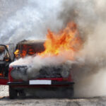 HIGHWAY EXPLODES — What Went HORRIBLY WRONG… A car engulfed in flames with smoke billowing out