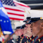 MARINE Bases Are SECURE? — Apparently NOT Marines in uniform stand at attention with American flag.