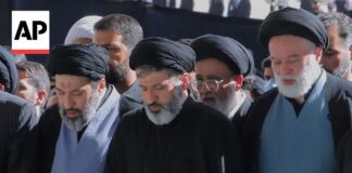 Sons of late Iran Supreme Leader Ayatollah Ali Khamenei attend his funeral
