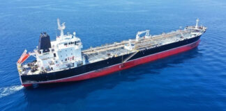 Oil tanker ship sailing on calm blue sea