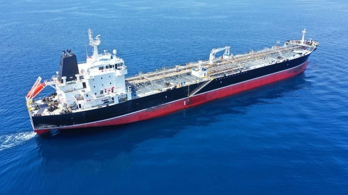 Oil tanker ship sailing on calm blue sea