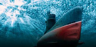 Submarine underwater with light filtering from the surface.