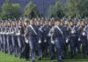 Warfighter First: Classrooms Face Brutal Cut military cadets marching in formation with rifles