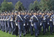 Warfighter First: Classrooms Face Brutal Cut military cadets marching in formation with rifles