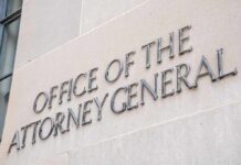 Kennedy Alarm: Stall Now, Lose DOJ Later Office of the Attorney General building sign