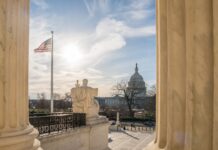 Beautification Bonanza While Parks Crumble U.S. Capitol dome viewed between marble columns at sunset