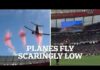 Insane Flyover Sparks Safety Uproar Moment two airliners nearly hit packed stadium in 'dangerous' pre-game flyover is caught on camera