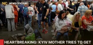 WATCH: Kyiv Mother Struggles to Get Sons Across River Amid Air Raid Alerts | AC1W
