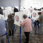 Permanent Majority? Not So Fast Voters fill out ballots at polling booths in a busy voting room