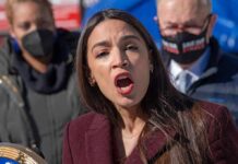 The Democratic Money Fight Goes Public woman speaking passionately at outdoor event