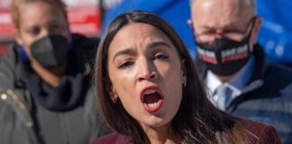 woman speaking passionately at outdoor event