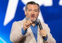 GOP Succession Fight: Cruz Crashes Line man speaking on stage with a microphone