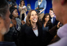 Progressive Pushback Brewing For Harris? Kamala Harris smiling among supporters with Maya Harris nearby
