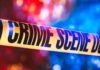 He Was Drunk And He Killed Her Crime scene tape with blurred emergency lights in background