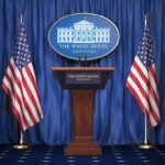 Bombs Off, Blockade On—What’s Trump Planning? White House press podium with microphones and two American flags