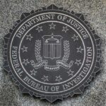 FBI seal mounted on a granite wall