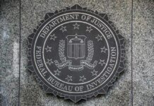 FBI seal mounted on a granite wall