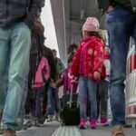 Commute Chaos Grips Dnipro Crossings Crowd walking on a train platform