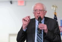 Campaign Surrogate Or “Just A Podcaster”? Elderly man speaking into a microphone