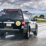Zoo Denies Escape As Panic Spreads Sheriff SUV driving on a highway