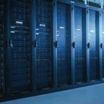 Data Centers Lowered Taxes—Now Comes The Catch Row of server racks in a data center