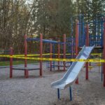 Playground equipment wrapped with caution tape