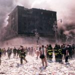 Rescuers Rushed In. Then Came Another Drone First responders amid debris near a heavily damaged building