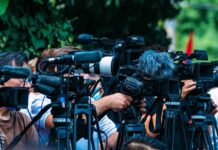 Tradition Vs. Cruelty Clash Erupts TV news cameras crowding together at an outdoor event
