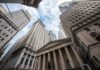Wall Street’s New Money Machine Is Taking Over Skyscrapers and a neoclassical building with columns viewed from street level