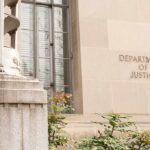 BUSTED — DOJ INDICTS 8 For Shocking TERRORIST Plot Department of Justice building facade with stone sign and window