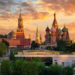 Symbolic Punishment, Real Casualties: Classes Gone St. Basil's Cathedral and Kremlin towers at sunset