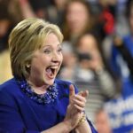 One Social Media Post Summoned An Awkward Past Smiling woman in blue clapping at an event