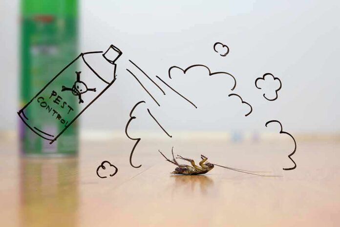 shutterstock_605603552 Dead cockroach on floor with drawn pest spray can and fumes