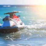Open Water, One Strike—Florida Tragedy Jet ski on turquoise ocean waves near shore