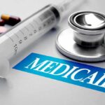 Millions In Home Care Claims Raised Bizarre Questions Stethoscope and syringe beside Medicaid label