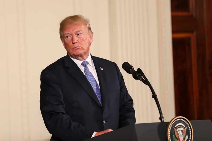 Donald Trump at a podium with microphone