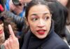 Brotherhood Bombshell? AOC Cries Racism woman with red lipstick in a crowd turning her head