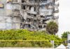Partially collapsed apartment building with exposed interiors