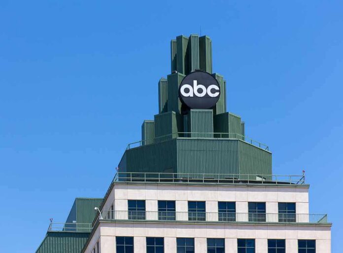 shutterstock_275394884-1 abc logo atop green-stepped building against clear blue sky