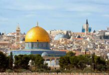 Loyalty Question Roils Michigan Senate Bid Dome of the Rock with golden dome in historic cityscape