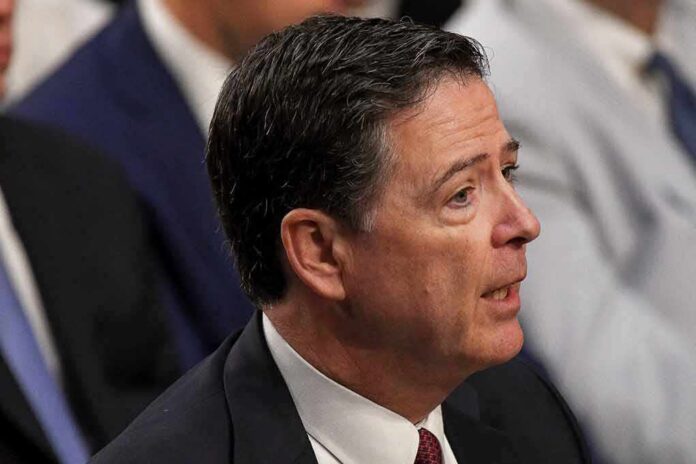 shutterstock_675303889 James Comey speaking in profile at an event