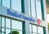 Bank of America branch exterior with logo on glass building