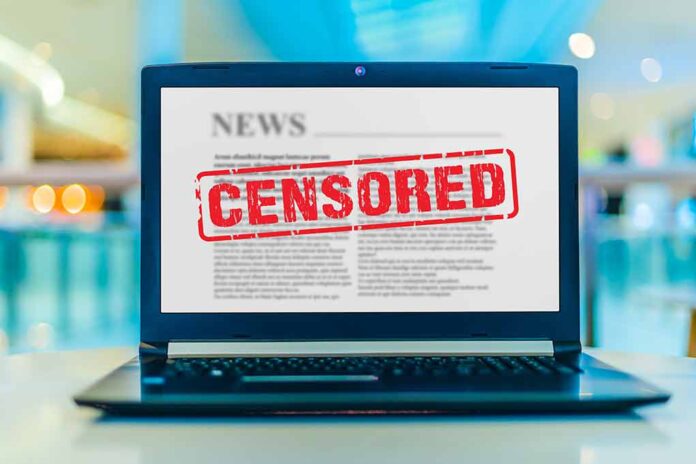 1715215150 featured image Laptop screen displaying censored news article.