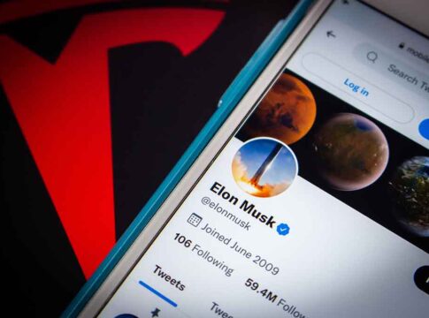 Twitter profile page on a smartphone screen.